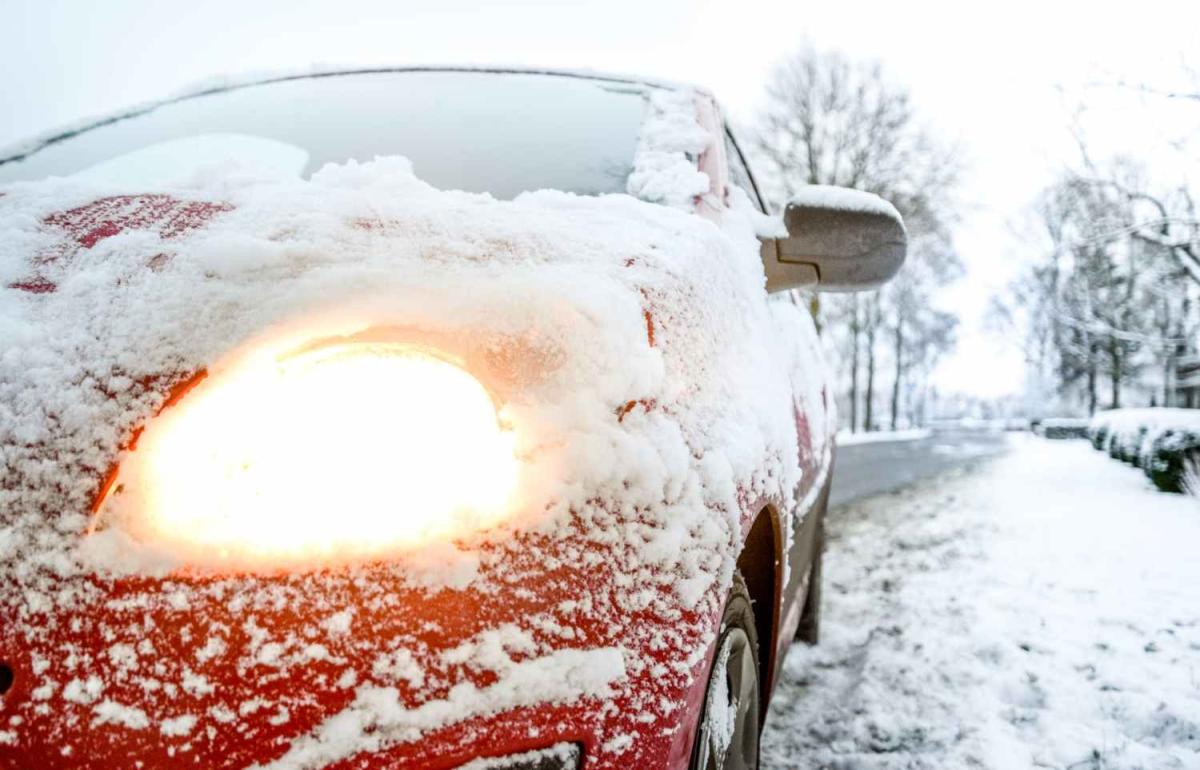 Car Covered In Snow